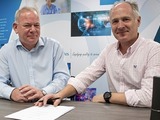 Rob Vint (Managing Director of Alpha Laboratories Ltd.) & Right: Daniel Bee (CEO of Clinical Design Technologies Ltd.) sign their partnership agreement.