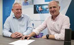 Rob Vint (Managing Director of Alpha Laboratories Ltd.) & Right: Daniel Bee (CEO of Clinical Design Technologies Ltd.) sign their partnership agreement.