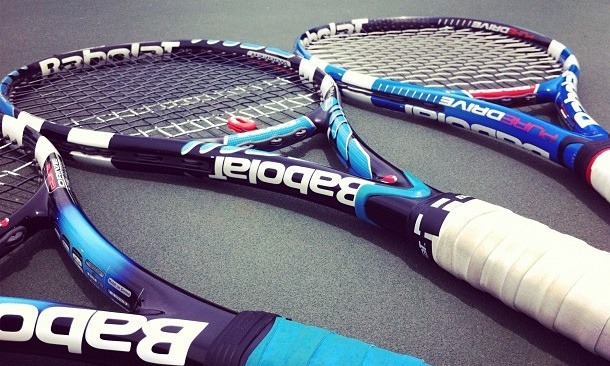 Graphite tennis racquet