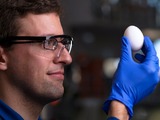 Chemistry major Stephan Kudlacek and professor Greg Weiss have developed a way of unboiling a hen eg