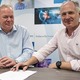 Rob Vint (Managing Director of Alpha Laboratories Ltd.) & Right: Daniel Bee (CEO of Clinical Design Technologies Ltd.) sign their partnership agreement.